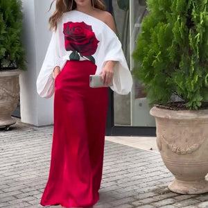 Conjunto de blusa com manga lanterna e calças largas com estampa rosa