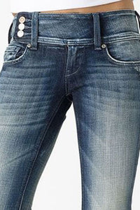 Jeans vintage cintura média flare botão lateral